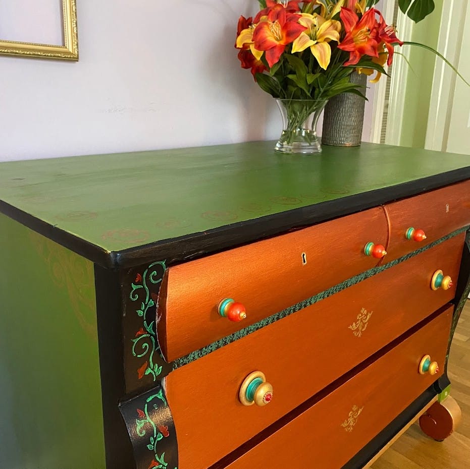 copper and green chest of drawers