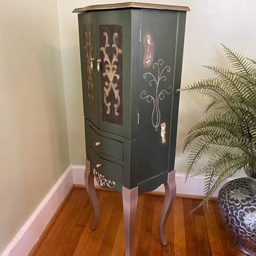 Elegant jewelry armoire in gay nineties style